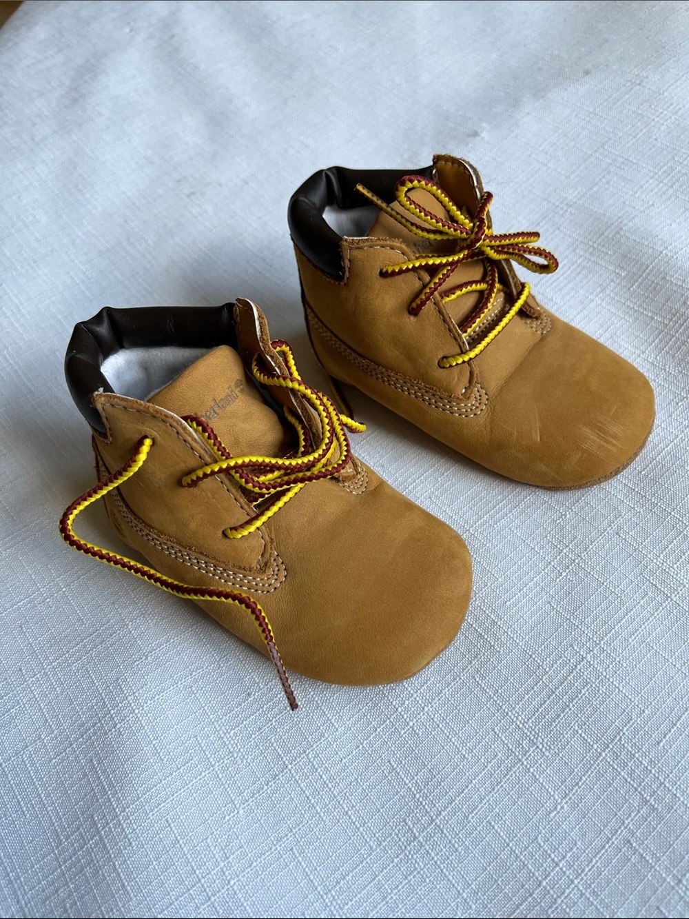Timberland Lace-Up Boots Infant Crib Booties in wheat nubuck.
Size 3